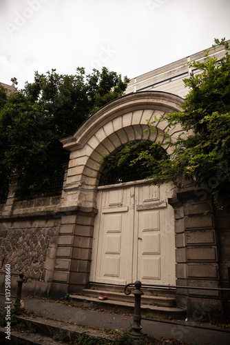 Old arched gate in a stone wall