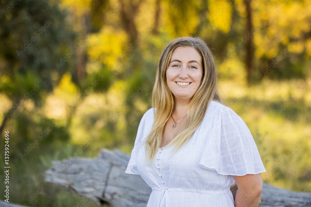 Portrait of woman wearing white dress in the Australian bush Portrait of woman wearing white dress in the Australian bush