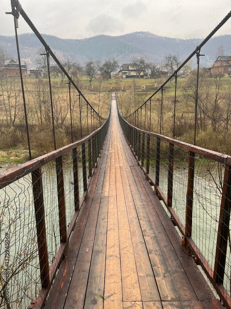 Obraz premium wooden bridge over the river
