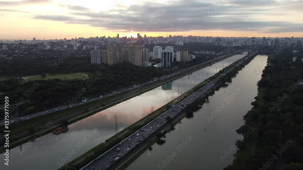 Amazing megalopolis São Paulo Latin America with sunrise on the Pinheiros River along the marginal highway Amazing megalopolis São Paulo Latin America with sunrise on the Pinheiros River along the marginal highway
