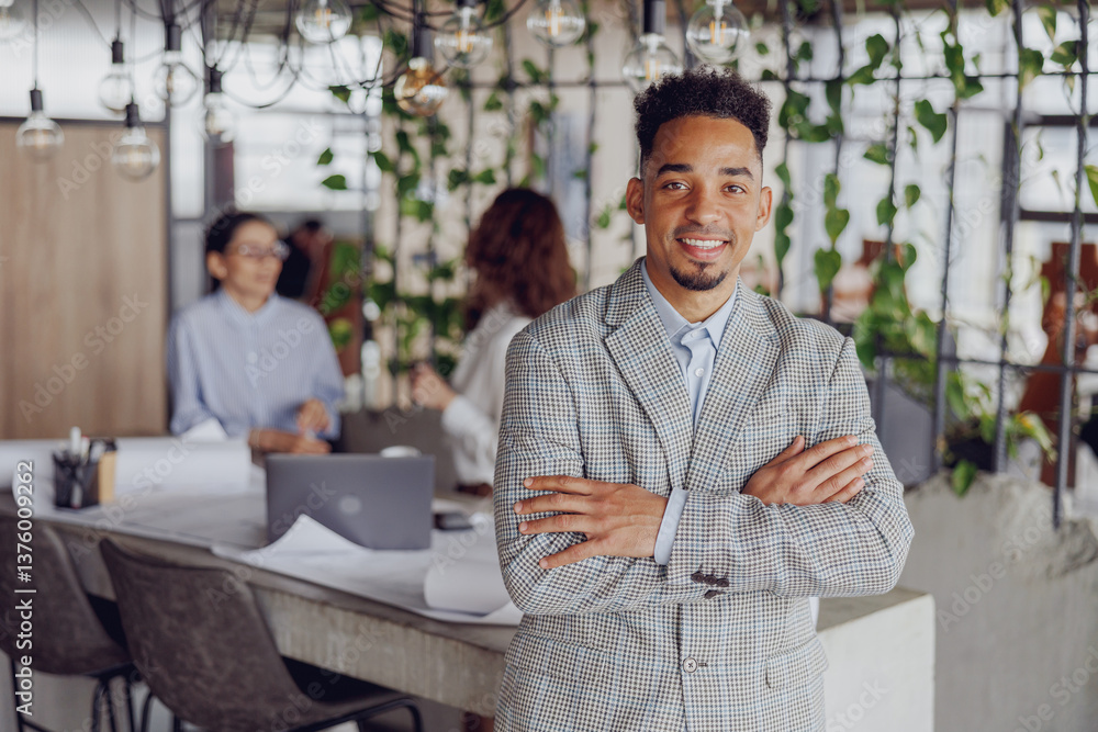 A stylish and professional individual poses confidently within a vibrant, plantfilled and stylish workspace A stylish and professional individual poses confidently within a vibrant, plantfilled and stylish workspace