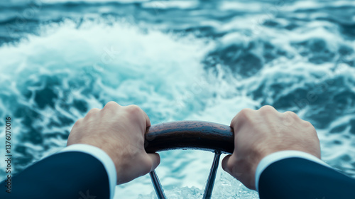 Captain's hands steering ship in rough waters
