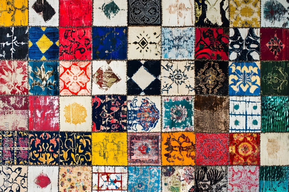 A vibrant and textured patchwork pattern featuring traditional geometric patterns A vibrant and textured patchwork pattern featuring traditional geometric patterns