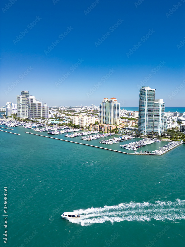 Miami beach cityscape. Miami summer aerial view. Miami Beach shoreline. South Beach Miami aerial view. Blue ocean in Florida skyline. Miamis cityscape. Ocean coast. Summer vacation in America.