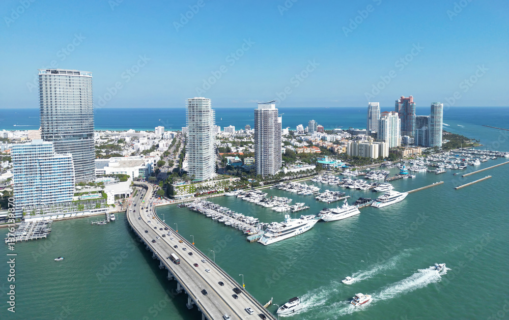 Miami Beach cityscape. Miami summer aerial view. Miami Beach shoreline. South Beach Miami aerial view. Blue ocean in Florida skyline. Ocean coast. Summer skyscraper skyline from drone. Miami Beach cityscape. Miami summer aerial view. Miami Beach shoreline. South Beach Miami aerial view. Blue ocean in Florida skyline. Ocean coast. Summer skyscraper skyline from drone.