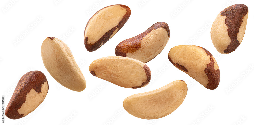 Obraz premium Falling brazil nuts isolated on white background