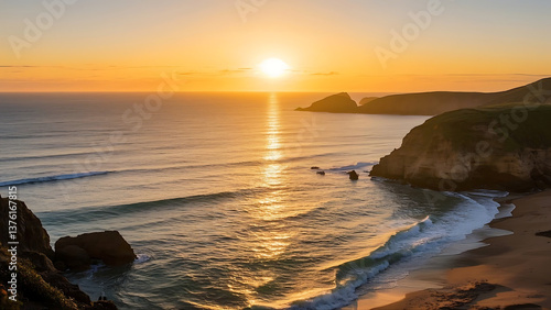 Coastal sunset view with sun glowing over the ocean and rocky cliffs