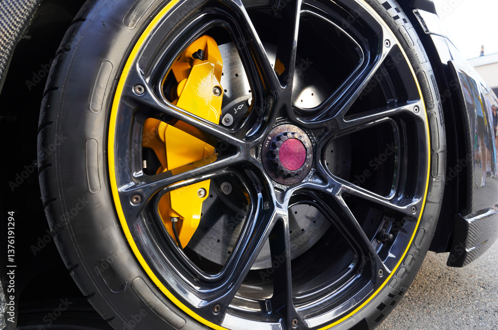 Tyre Alloy wheel with calipers, racing brakes of sport car. Racing brake disc, low profile tyres. Race car test driving. Lower-profile tires of drag, drift cars. High-performance sports cars. Tires. Tyre Alloy wheel with calipers, racing brakes of sport car. Racing brake disc, low profile tyres. Race car test driving. Lower-profile tires of drag, drift cars. High-performance sports cars. Tires.