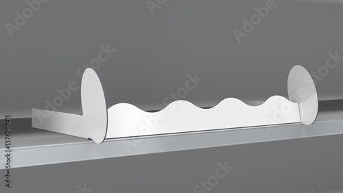 Bild auf Leinwand Mockup of a retail shelf with rounded stoppers and a wave shelf talker