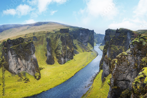 Unique landscape of Fjadrargljufur in Iceland. Top tourism destination. Fjadrargljufur Canyon is a massive canyon about 100 meters deep, located in South East of Iceland.