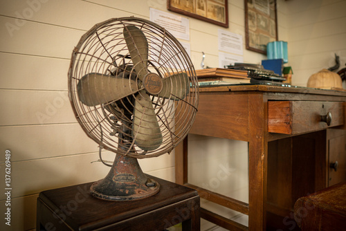 old vintage electric fan on a table