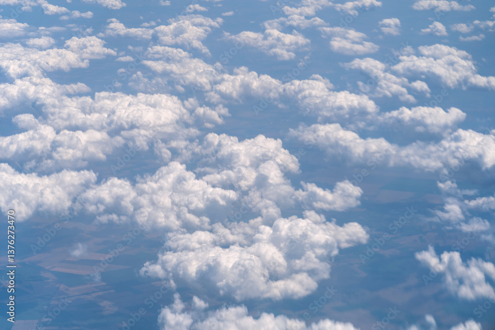 Naklejka premium Blue Sky with White Clouds, Flying above Sunny Cloudy Sky Texture Pattern, Fluffy Clouds Plane View