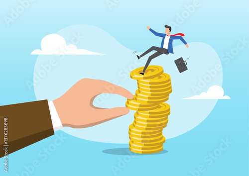 A giant hand pulling back money from a coin stack