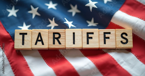 Scrabble Tiles Spelling 'TARIFFS' on American Flag