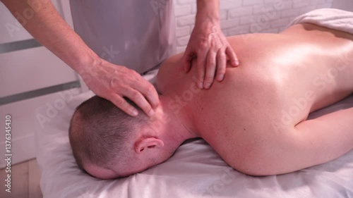 Massage procedure for relaxing the neck muscles - useful spa procedure and healthy body