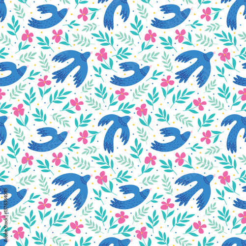 Seamless pattern with blue flying birds and floral elements. Spring vector background design for wrapping paper, textile and fabrics