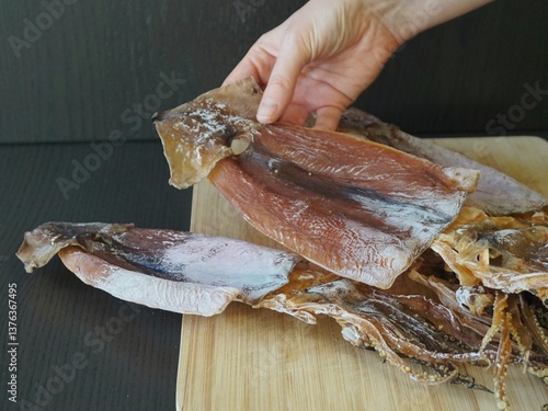 Dried squid. Closeup of dried squid on a dark background, South Korea, South Korea, Asia