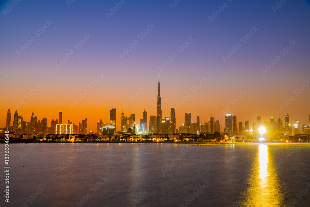 Naklejka premium Beautiful of Dubai Skyline view from the Dubai Creek. Panoramic view of Dubai city skyline. Cityscape in Dubai. UAE.