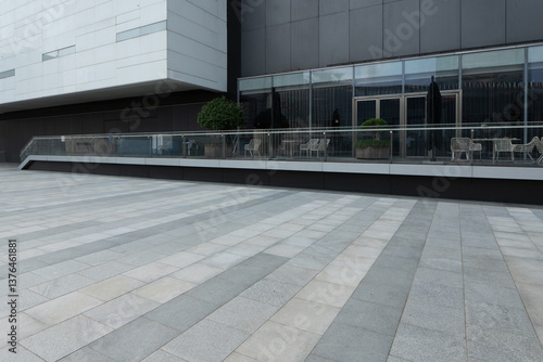 empty concrete ground in front of modern office buildings in downtown. floor for copy space