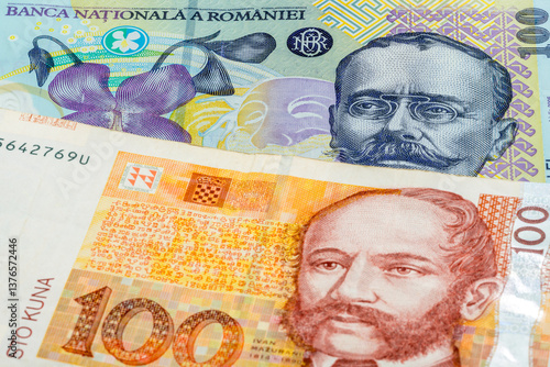 Fototapeta Naklejka Na Ścianę i Meble -  100 Romanian leu and 100 Croatian kuna banknotes. International trade concept