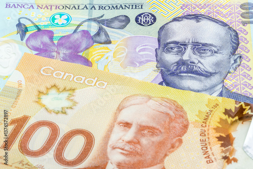 Wallpaper Mural 100 Romanian leu and 100 Canadian dollar banknotes. International trade concept Torontodigital.ca