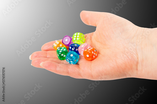 Wallpaper Mural Colorful assortment of plastic dice held in an open hand during a tabletop game session Torontodigital.ca