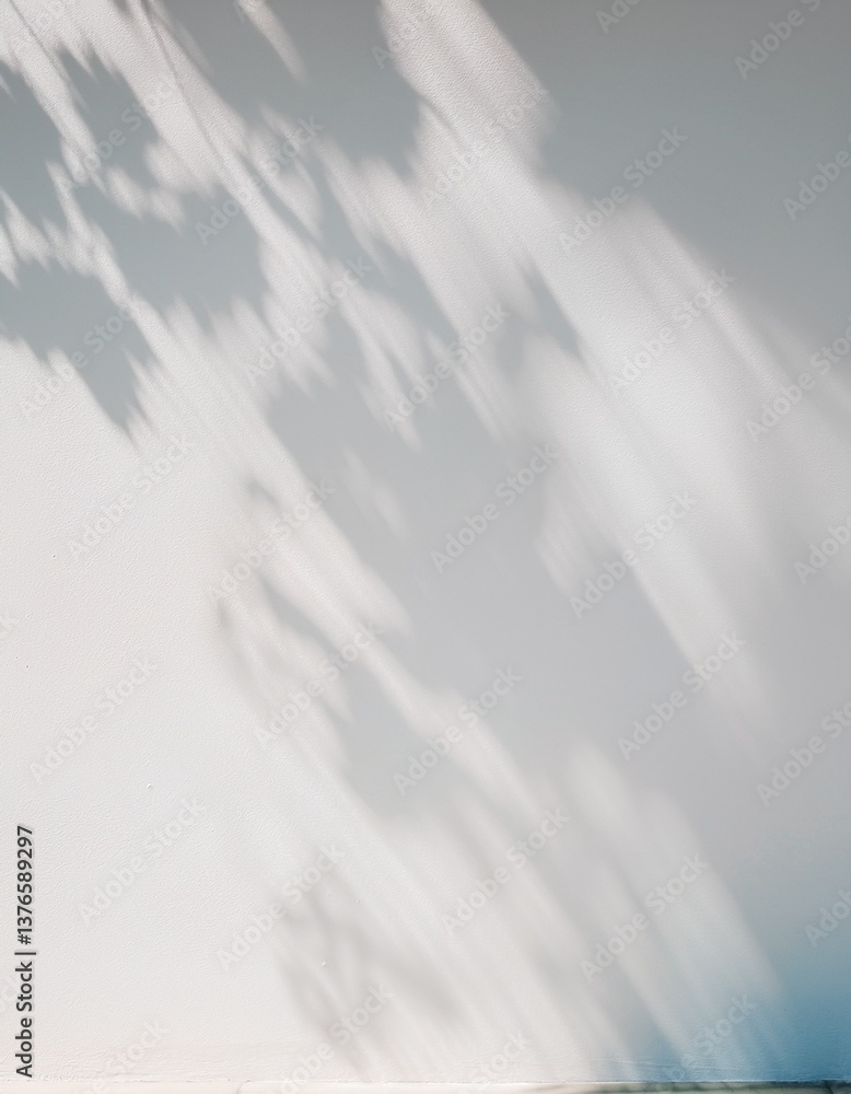high-resolution abstract image of soft natural tree leaves casting delicate shadows on a white wall background. The organic shapes create a calming, minimalist aesthetic with subtle variations in lig high-resolution abstract image of soft natural tree leaves casting delicate shadows on a white wall background. The organic shapes create a calming, minimalist aesthetic with subtle variations in lig
