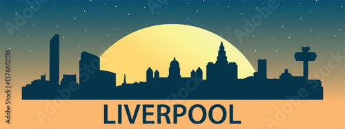 Black silhouette of the city of Liverpool against the background of the Big Yellow Moon and starry sky