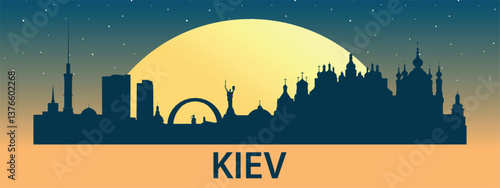 Black silhouette of the city of Kyiv against the background of the Big Yellow Moon and starry sky