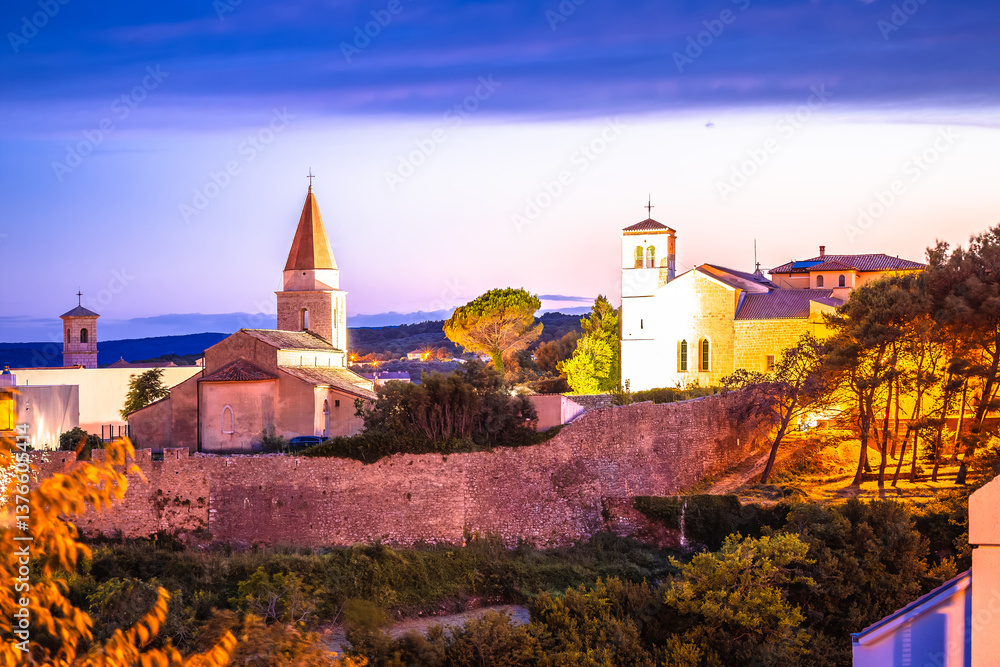Croatia. Island town of Krk defense walls and landmarks sunset view