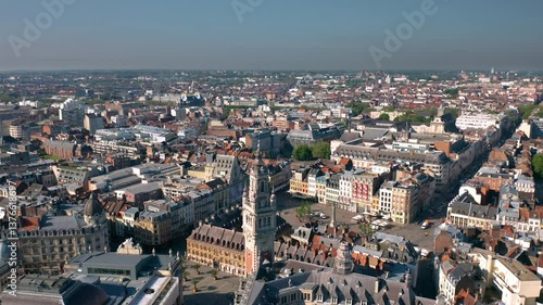 Cityscape of Lille (Hauts-de-france, Flanders, France) at sunset: Aerial skyline view of the historical Grand Place du Général-de-Gaulle, old town main square. 