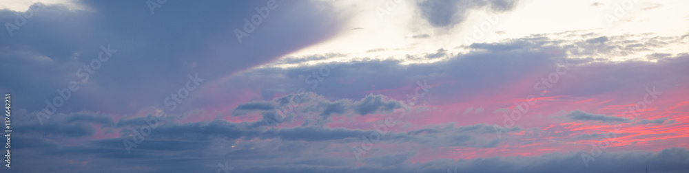Dusk, Sunset Sky Clouds in the Evening with colorful Orange, Yellow, Pink and red sunlight and Dramatic storm clouds on Twilight sky, Landscape horizon Golden sky nature Summer Background Dusk, Sunset Sky Clouds in the Evening with colorful Orange, Yellow, Pink and red sunlight and Dramatic storm clouds on Twilight sky, Landscape horizon Golden sky nature Summer Background