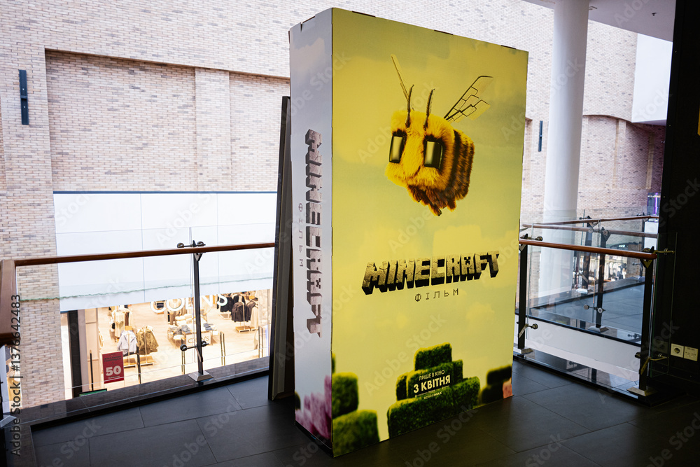 Obraz premium Colorful stand promoting Minecraft bee themed animated movie in the shopping mall