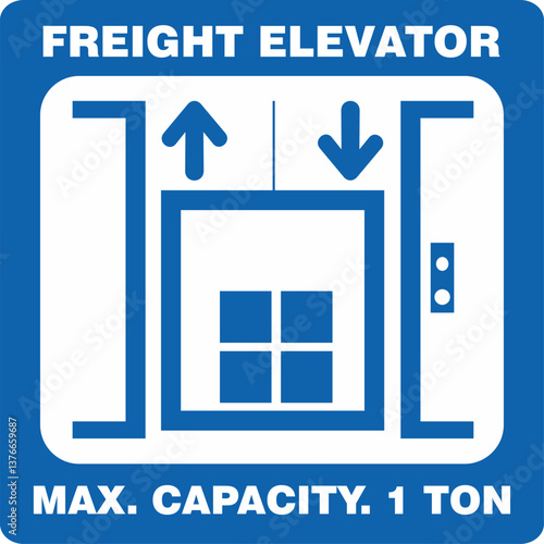A blue square with an image of a freight elevator , MAX. CAPACITY. 1 TON.