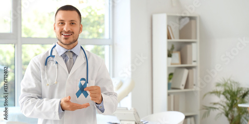 Male urologist with blue ri...