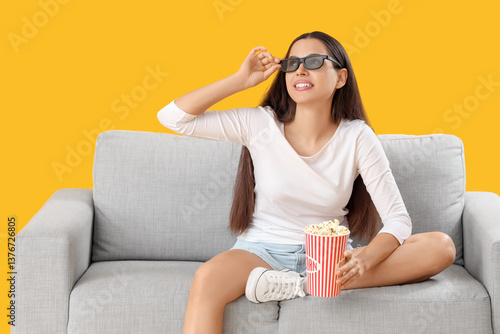 Young woman in 3D glasses w...