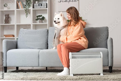 Young woman with Samoyed do...