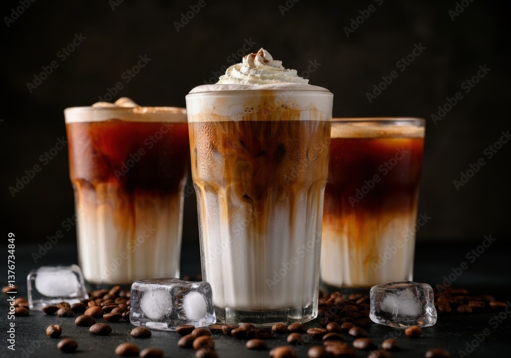 Iced coffee drinks with whipped cream and coffee beans on a dark background Iced coffee drinks with whipped cream and coffee beans on a dark background