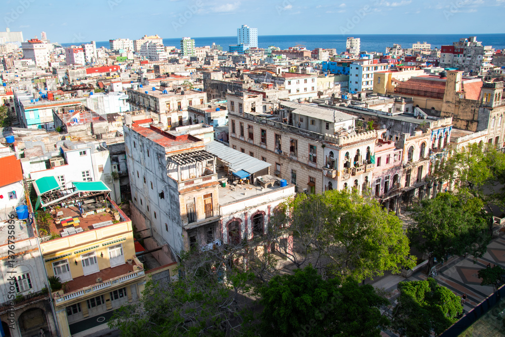 Obraz premium A cityscape of the city of Havana, Cuba as seen from the Iberostar Hotel in Parque Central.
