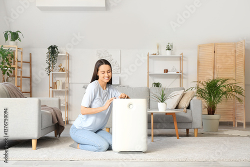 Modern humidifier and young...
