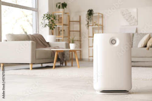 Photos Modern humidifier and grey sofa in stylish living room
