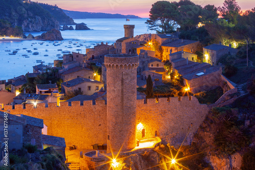 Obraz na płótnie Medieval stone towers and coastal village at sunrise in Tossa de Mar, Spain w salonie