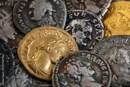 A treasure of Roman gold and silver coins.Trajan Decius. AD 249-251. AV Aureus.Ancient coin of the Roman Empire.Authentic silver denarius, antoninianus,aureus of ancient Rome.Antikvariat.