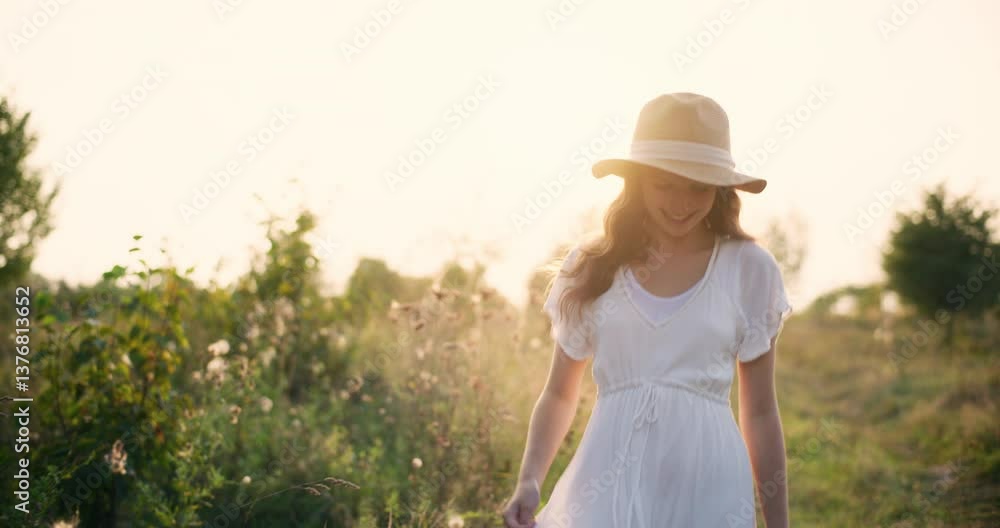 Joyful girl runs along path at golden hour Joyful girl runs along path at golden hour