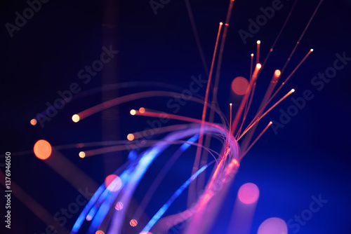 Radiant fiber optic threads in motion