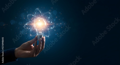 Hand holding light bulb with glowing atom science concept illustration