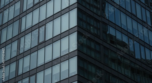 Wallpaper Mural A Modern High-Rise Office Building with Reflective Glass Facade Displaying a Contemporary Urban Aesthetic in a City Setting Torontodigital.ca