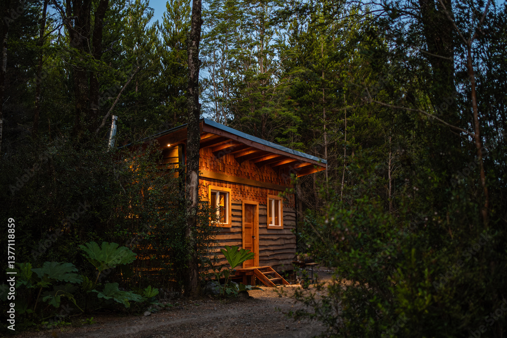 Cozy Wooden Cabin in Serene Forest Setting at Dusk Cozy Wooden Cabin in Serene Forest Setting at Dusk