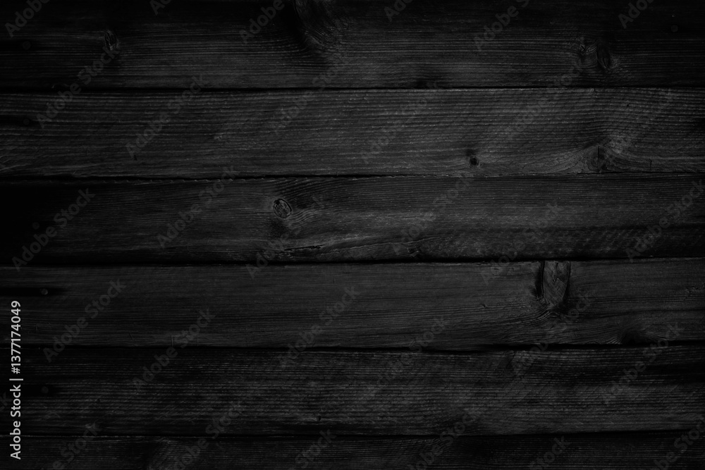 Black white old wooden wall. Close-up. Dark grunge background for design.