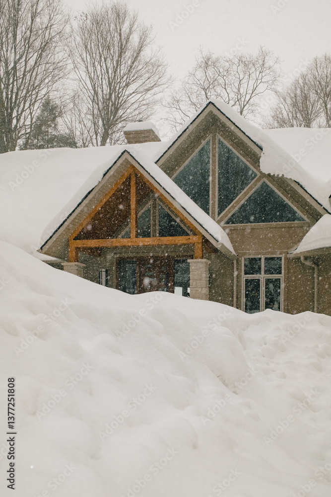 Snow-Covered Cabin with Large Windows Snow-Covered Cabin with Large Windows